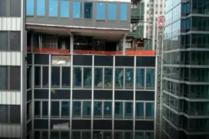 Buckled columns in Manhattan office reserved for residential conversion halted because of concerns over structural integrity of the site building