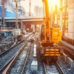 Workers on a public transportation construction project as Congress considers temporary federal funding.